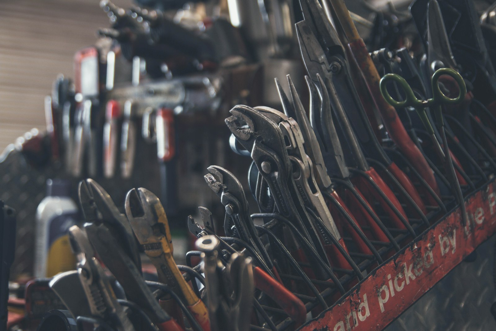 A wall of hand tools in the Kreater fabrication shop